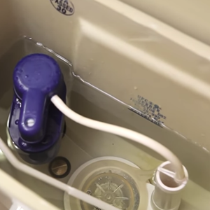 Adjusting a toilet valve