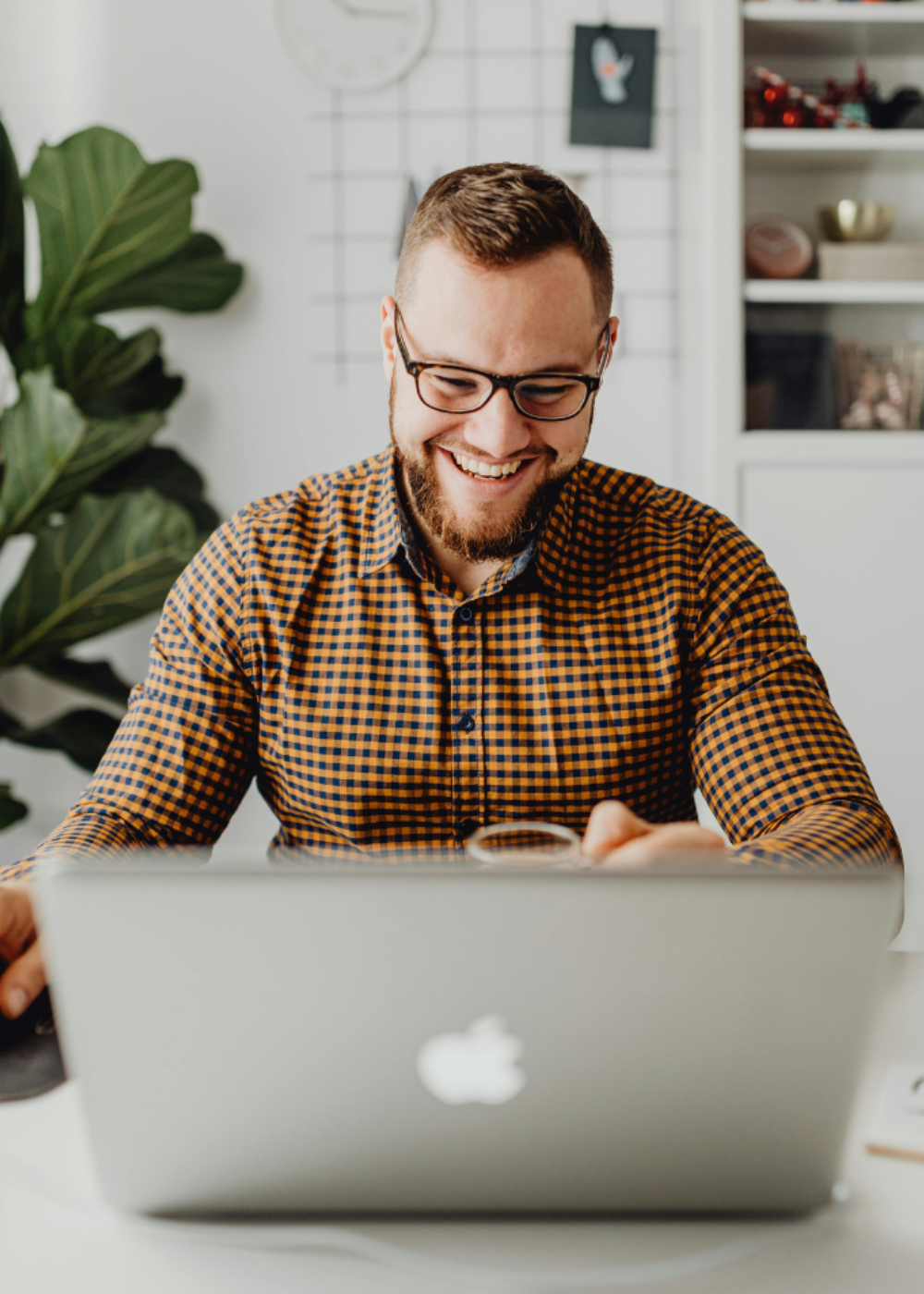 Inspector and homeowners sitting down and reviewing inspection results on tablet