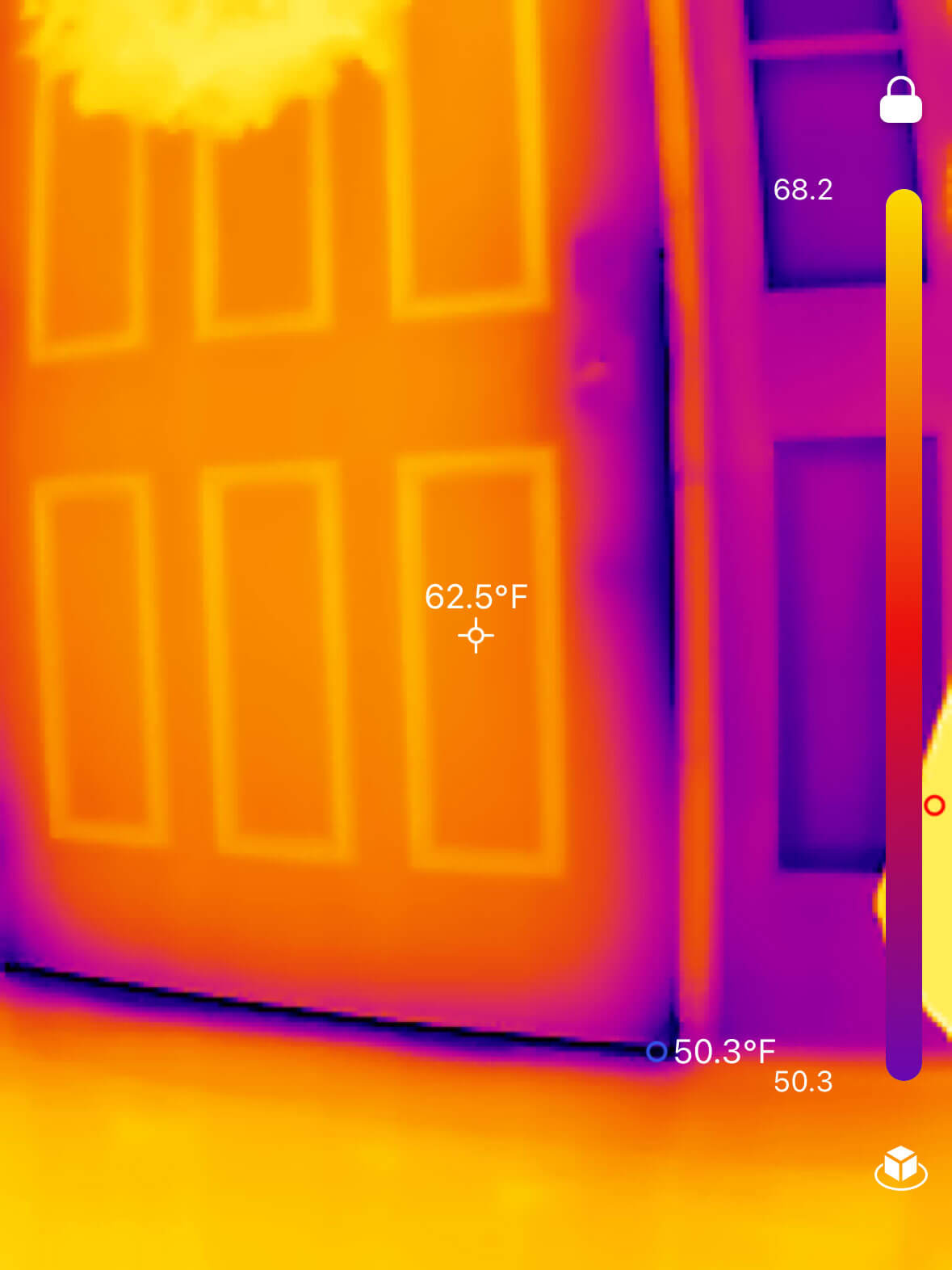 Inspector and homeowners sitting down and reviewing inspection results on tablet